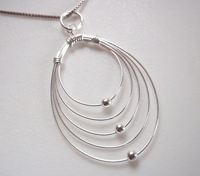Konzentrische Bänder mit beweglichen Silberkugeln Anhänger 925 Sterling Silber 