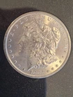 1883-CC CARSON CITY SILVER DOLLAR IN ORIGINAL 1972 GOVT SALE PACKAGING "NOS"