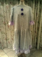 Panto Dame  Blue/Lilac floral  material, 48" chest, Purple ribbon