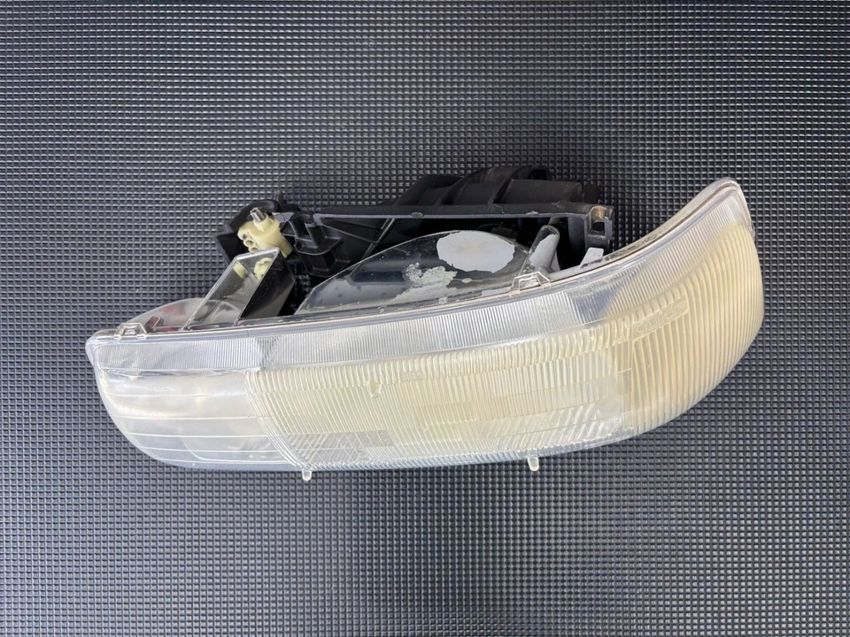 Faro izquierdo del conductor OEM 99-06 Chevrolet Tahoe/Suburban Foto 2 de 4