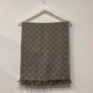 Étole Gucci avec franges