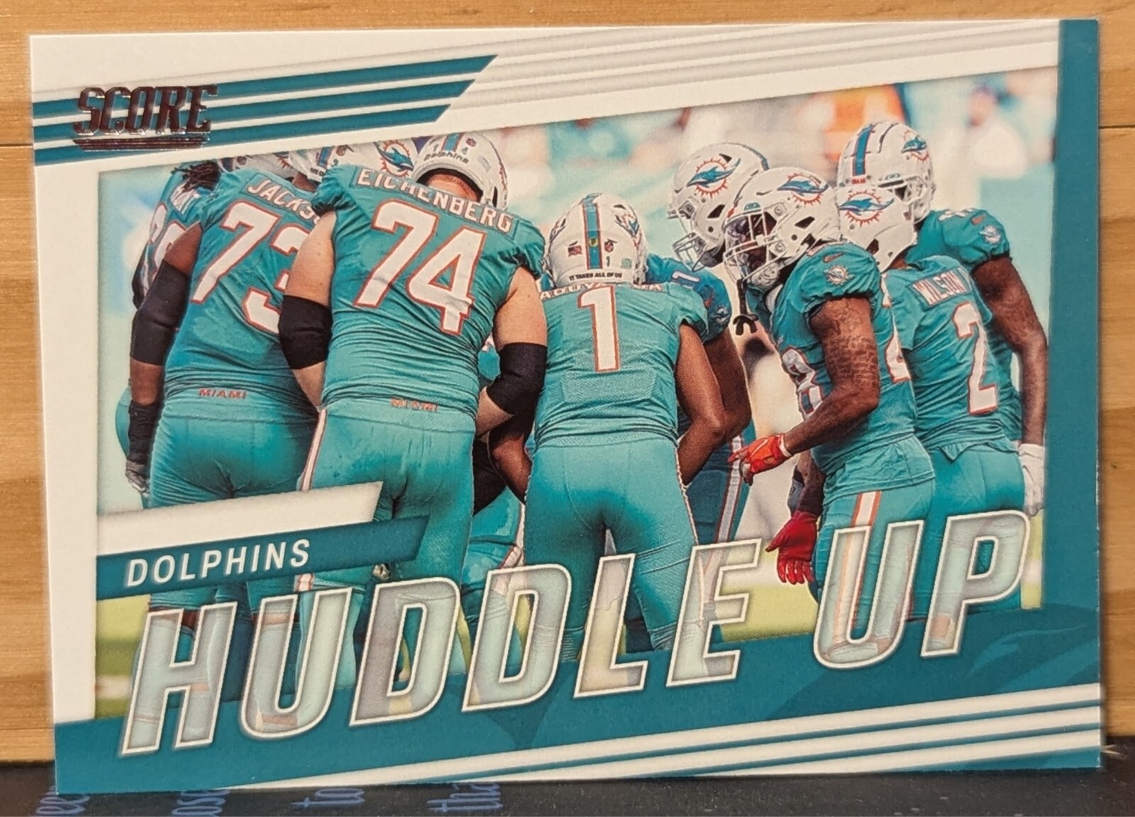 2023 Panini Score Huddle Up Miami Dolphins #HU-MIA