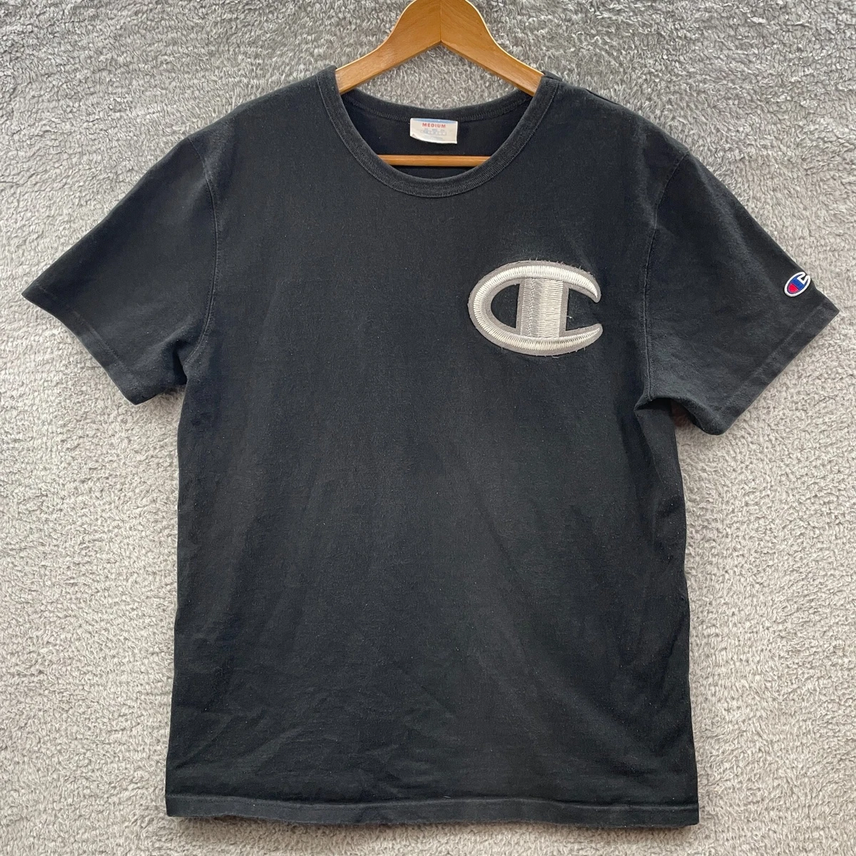 black and blue champion shirt