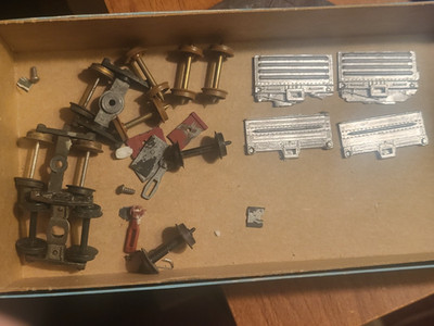 HO Misc. Parts J From Box labeled Trucks & Cast Gondola Ends