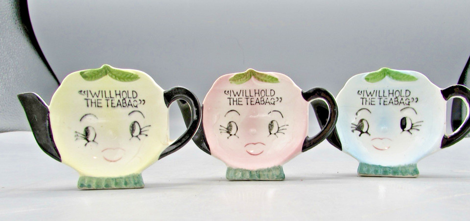 Anthropomorphic ceramic tea bag holders from Japan with a 'hold the bag' motto — delightfully weird vintage kitchenware with actual functionality.