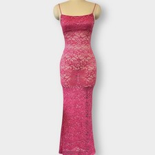 Fuchsia lace maxi dress with spaghetti straps and a straight neckline. 