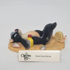 Charming Tails Fitz and Floyd Stewart’s Day in the Sun Skunk Beach Figurine