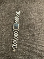 Vintage Gucci rectangular watch with stainless steel band