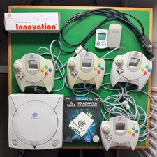 Dreamcast + 4 Controllers, VMU, Rumble Pack, SCART Cable, VGA Cable, Dreamshell