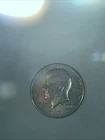 Kennedy half dollar. But. No Mint Mark
