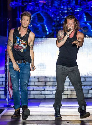 Tyler Hubbard Brian Kelley of Florida Georgia Line performs in sup- Old Photo 21