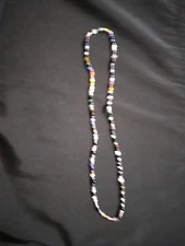 Multi Color Glass Seed Bead Necklace  Length 9in On Clear Stretch Cord
