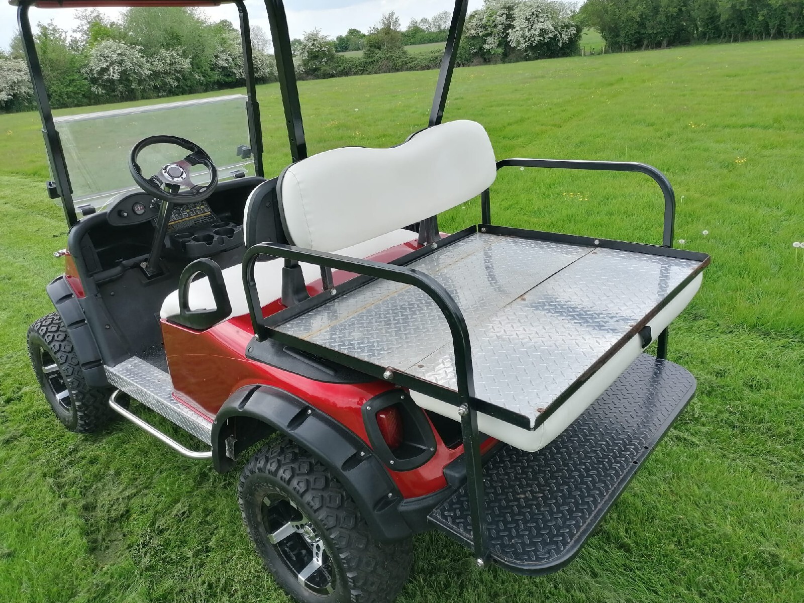 EZGO lifted electric golf buggy eBay