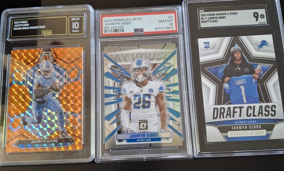 Lote Detroit Lion incluye 6 losas, 27 lijadoras Barry crudas y 5 Jahmyr GibbsRC crudas Foto 2 de 4