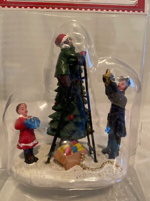 Holiday Time  Decorating the Tree, Father & 2 children Decorating theTree