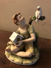 Vintage Lefton Dante  Boy holding Birdhouse Looking At A White Bird KW3082