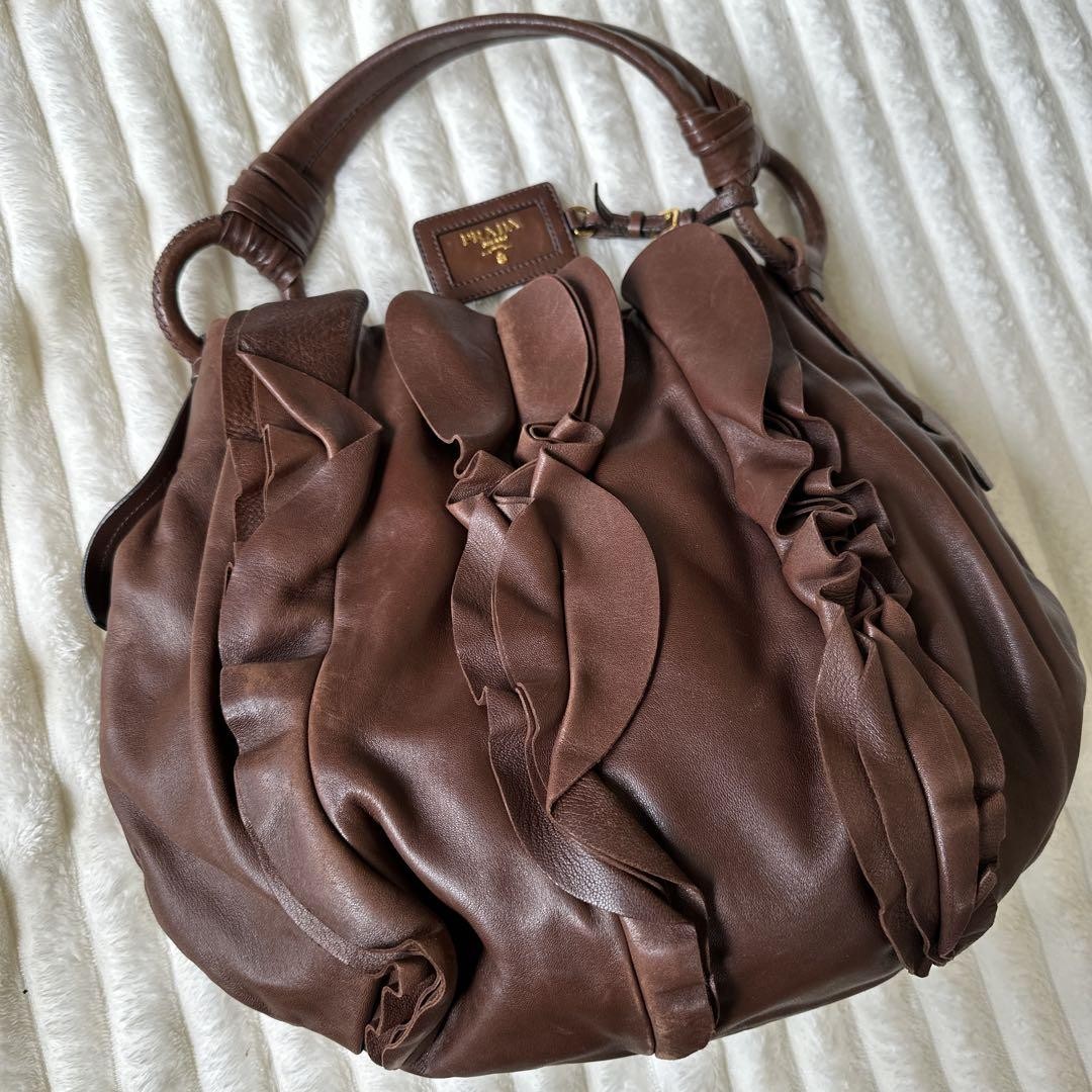 PRADA brown ruffle shoulder bag with elegant detailing