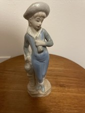 Porcelain Figurine Similar To Lladro Girl With A Hat Leaning On A Post