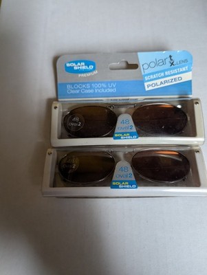 2 Pairs Solar Shield Polarized Clip On Sunglasses 48 oval 2 Full Frame Amber len