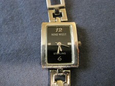 H421 ladys sterling silver NINE WEST quartz watch bracelet