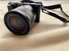 Sony Alpha 6000 Mirrorless Camera with Zeiss 16-70mm Lens and Accessories