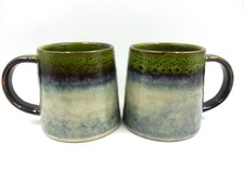Set of 2 Reactive Glaze Creme Brulee Mugs in Light Green and Mist.