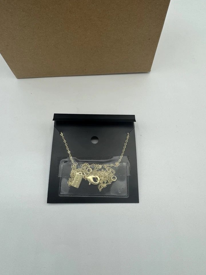 Colar pingente anel logotipo tom dourado Coach New York 16” + 2” extensor - Imagem 3 de 3