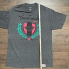 Gray Diamond Supply Co. T-shirt with black/red diamond logo, green laurel, and “GET YOUR SHINE ON” text.