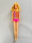Vintage Francie Barbie Doll and several outfits