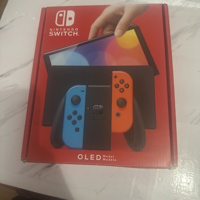 Nintendo Switch OLED With Zelda, Splatoon 2 And Mario Odyssey.