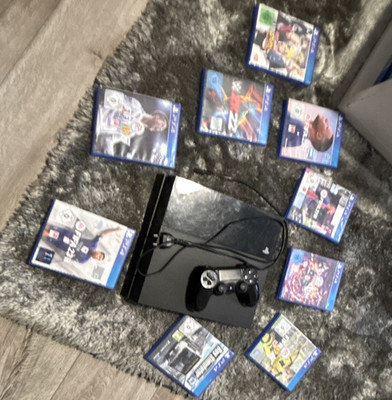 Sony PlayStation 4 Heimkonsole Schwarz Bundle mit DualShock 4, Kabeln & Spielen