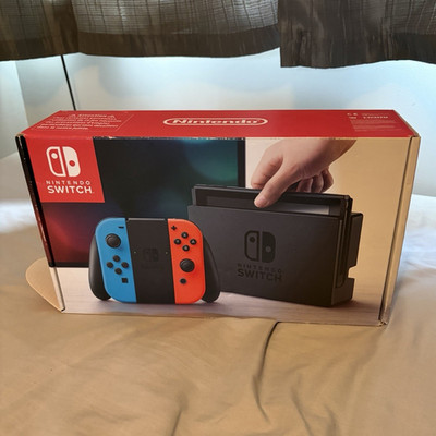 Nintendo Switch Konsole Bundle Neon Blau/Rot Joy-Con Dock Box Mario Rabbids