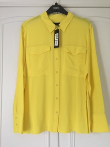 bright yellow blouse