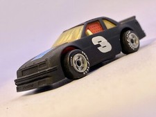 MATCHBOX??Premium 1990 CHEVROLET LUMINA MATT BLACK - HTF AMBER GLASS??