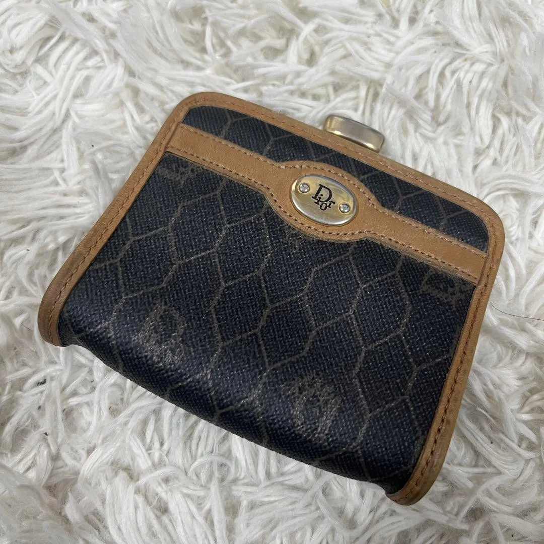 Porte monnaie Christian Dior en cuir nid d'abeille avec logo occasion très bon état