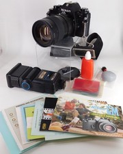 NIKON EM 35m SLR FILM CAMERA WITH ZYKKOR MC ZOOM LENS