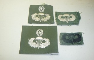 A Lot of 4 U S Army Collar Tab Patches Glow