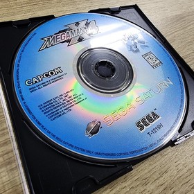 USED AUTHENTIC WORKING -) MEGA MAN X4 (- GAME DISC ONLY - SEGA SATURN