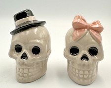 Image of Halloween Salt and Pepper Shaker Set Skulls His and Her