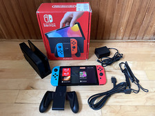 Nintendo Switch OLED Model HEG-001 Handheld Console - 64GB Nintendo Switch OLED Model HEG-001 Handheld Console - 64GB