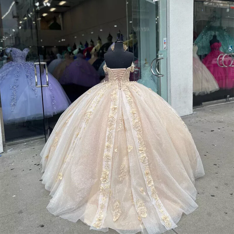 Gold champagne hotsell quinceanera dresses