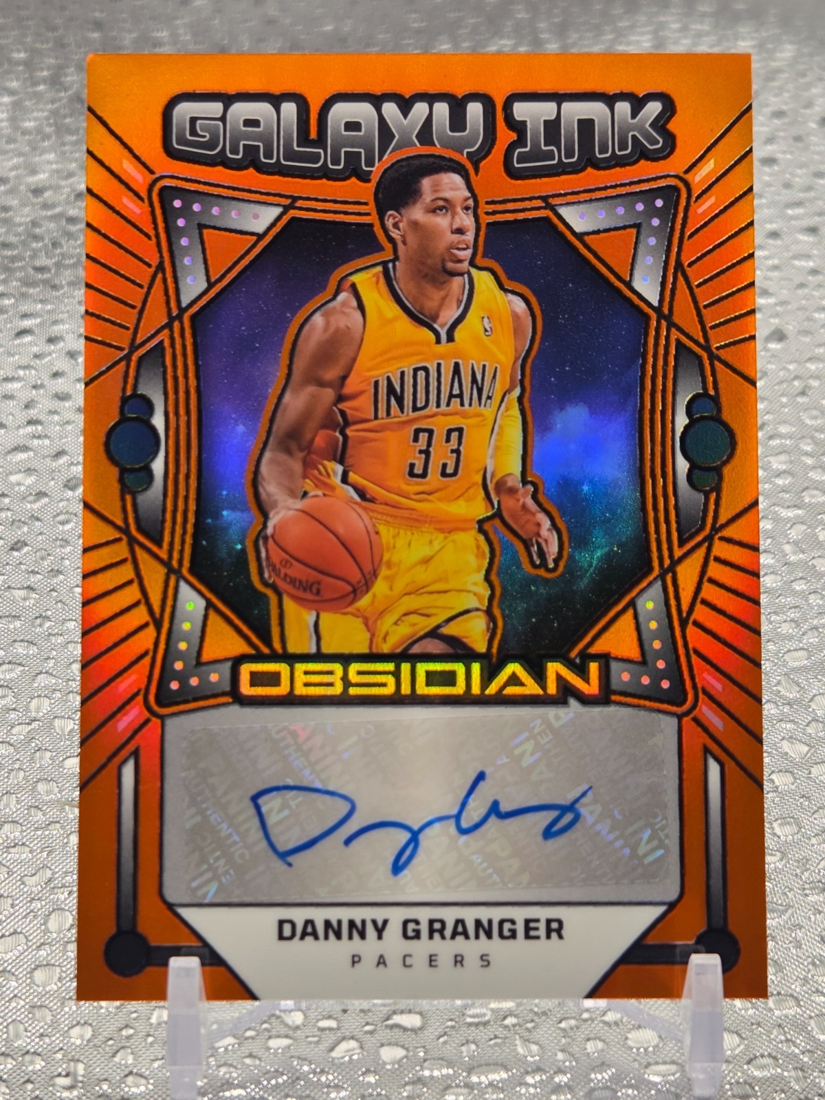 2024-25 Panini Obsidian Galaxy Ink [Orange] Danny Granger Auto GI-DGI /99