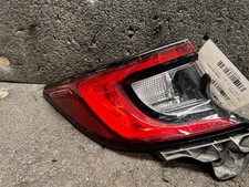 Used Left Tail Light Assembly fits: 2023 Toyota Corolla Hatchback quarter panel