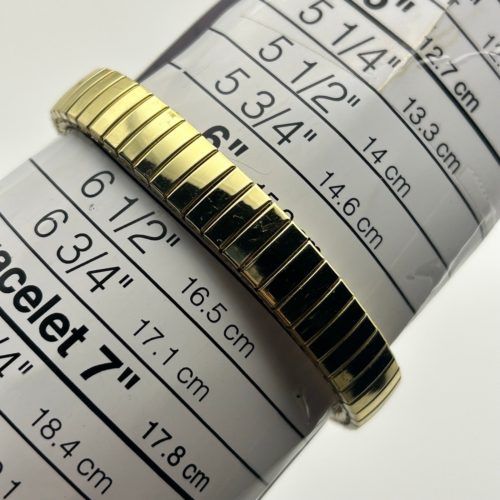 Gold-tone Oval Case Stainless Steel Stretch Band Women’s Watch Working image 8