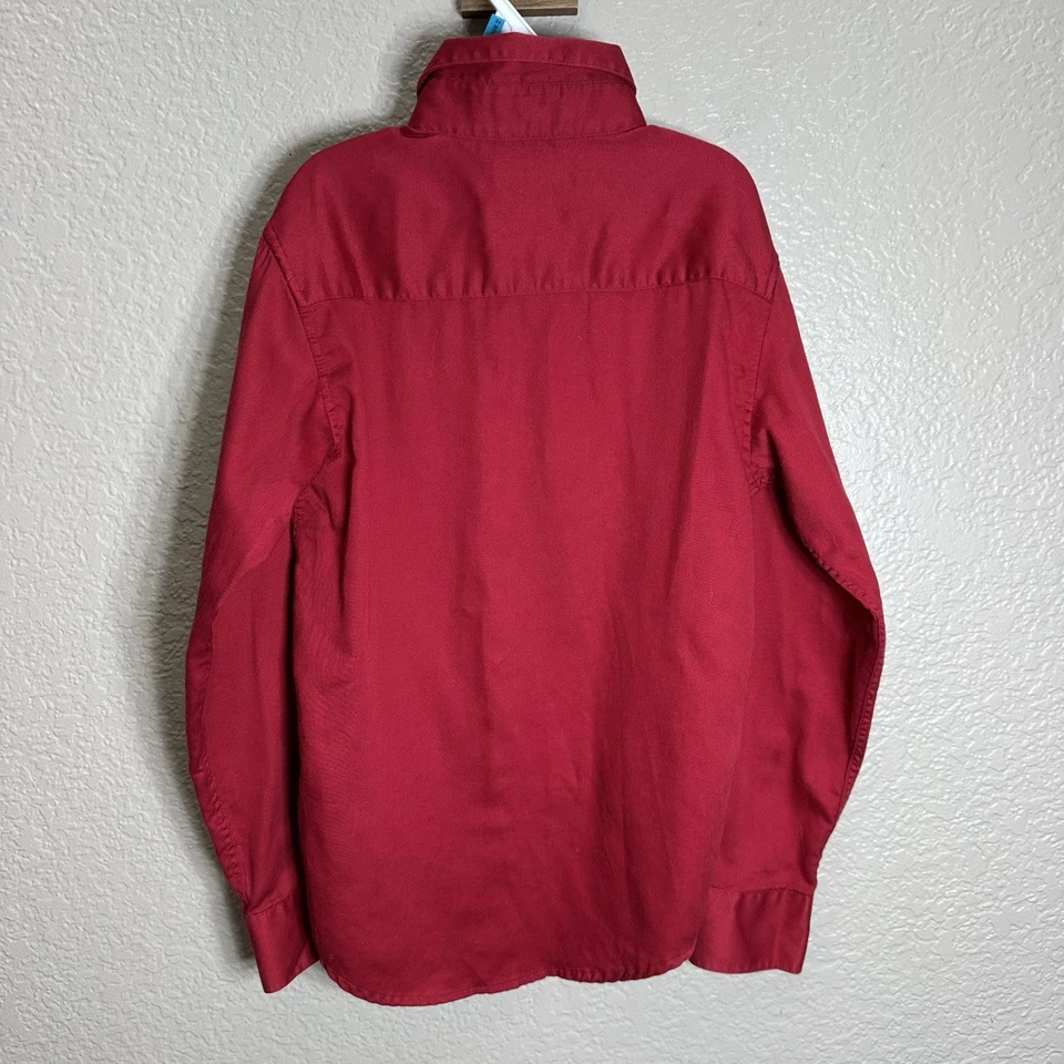 Camisa roja con botones elástica lisa calce ceñido Calvin Klein para niños talla 10 Foto 4 de 4