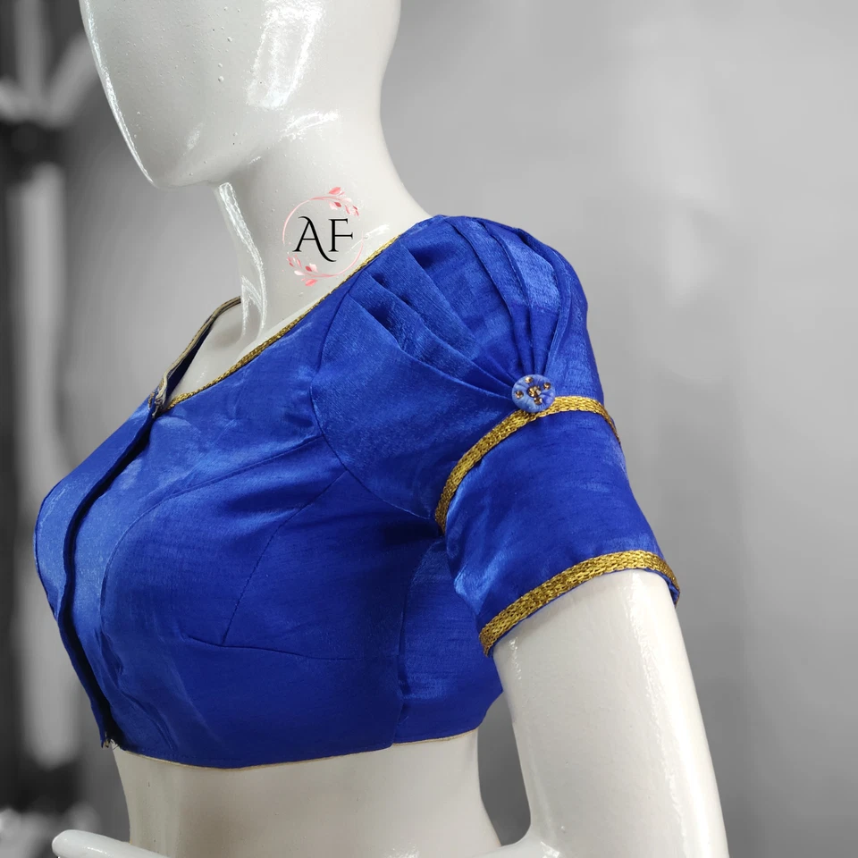 Elegante blusa de seda azul | Cuello profundo y mangas abullonadas | Borde de encaje dorado, Foto 3 de 4