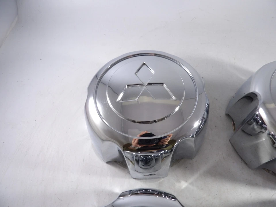 Juego de tapas centrales de cubierta de rueda central OEM 1997 1998 1999-2004 Mitsubishi Montero Foto 2 de 4