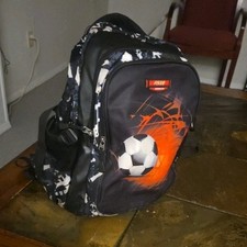 A Backpack That Comes In Balck White And Red. Has Been Used, Little To Non Stain