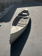 13”  aluminum Grumman weighs 58 lb no hole no dents 