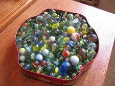 Lot Of Marbles In "Antique Tin"- Various Sizes And Colors "See Pictures"